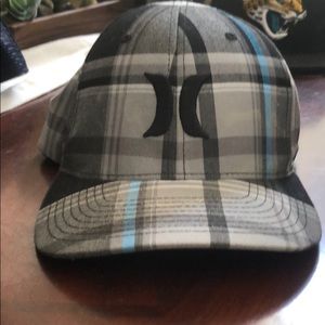 Great used condition Hurley plaid hat. Fitted